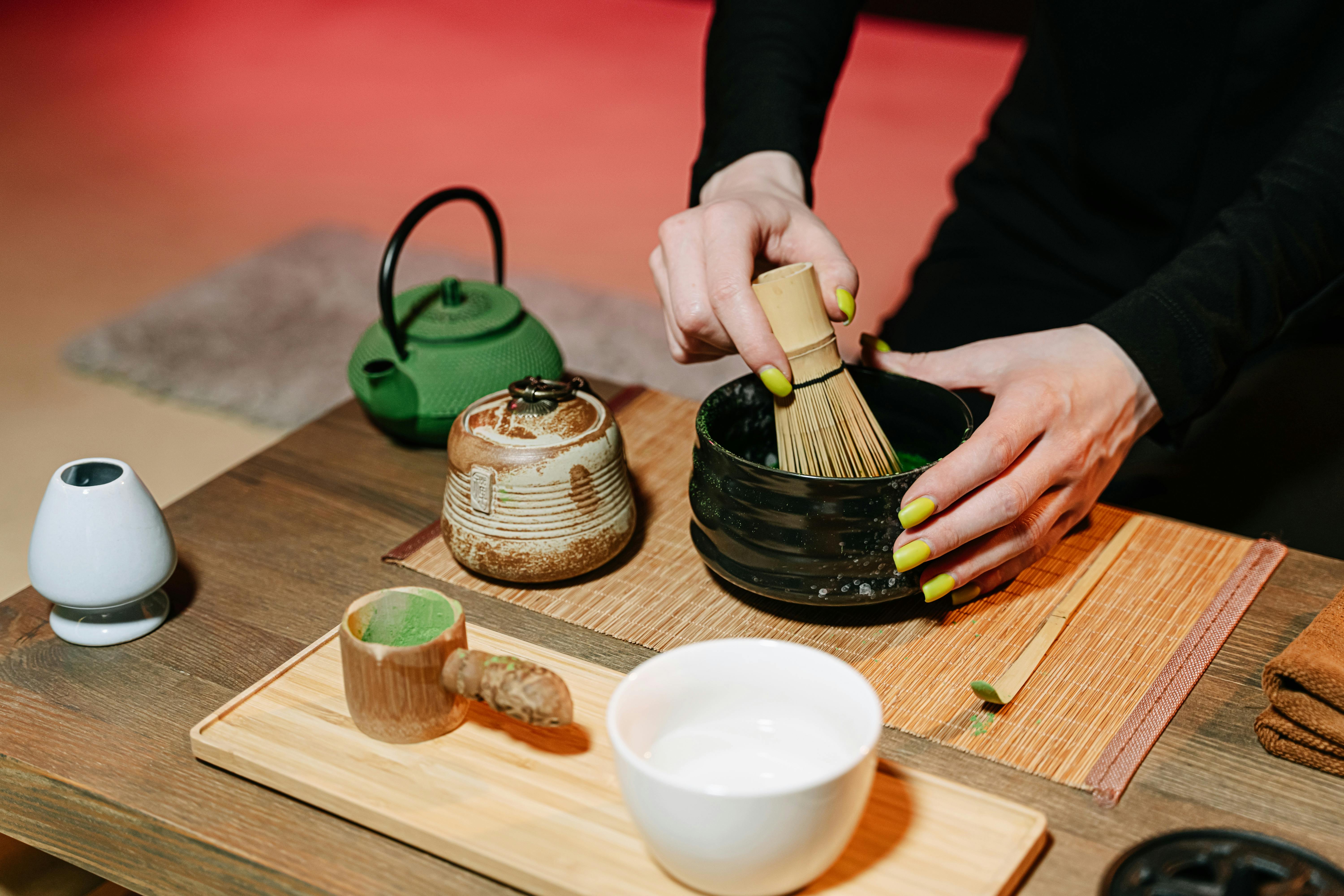 Person in flow making matcha